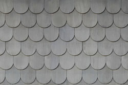 Photo of shingle roof tiles.